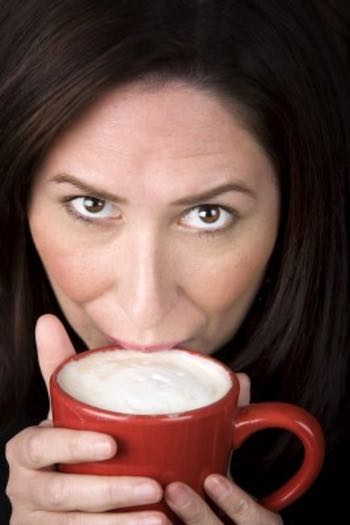 Girl Enjoying Delicious Mexican Coffee