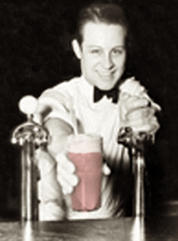 Old Fashioned Soda Jerk Serving a Fountain Beverage