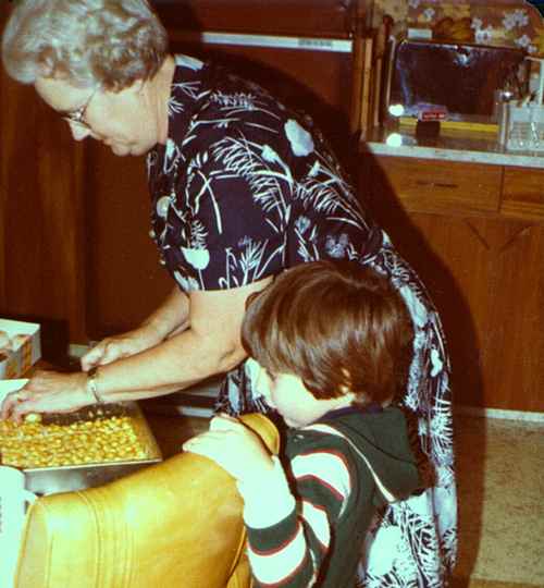 Sylvia McIlmoyle Cutting Her Peanut Butter Marshmallow Dessert Squares