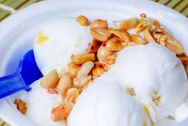 Bowl of Coconut Cream Ice Cream with Peanuts