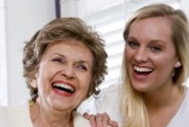 Mother and Her Daughter Laughing Together