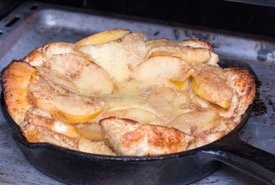 Dutch Baby Pancake Served With Applesauce