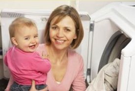 Mother and Her Baby Washing Clothes