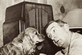 Man and His Dog Listening to the Radio