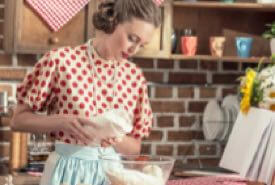 Young Woman Making a Homemade Pudding