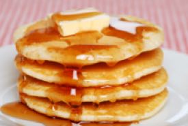 Stack of Old Fashioned Pancakes With Butter and Syrup