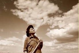 Old Farmer Gazing at the Sky to Forecast the Day's Weather