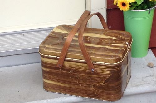 Vintage Picnic Basket Sitting on the Doorstep