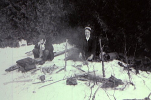 Enjoying Hot Dogs on a Winter Picnic