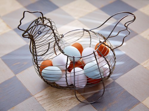 White and Brown Eggs in a Vintage Egg Basket