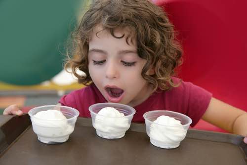 This homemade bag ice cream recipe is loads of fun, and the frozen treat tastes delicious. It's a great kid's recipe that's also educational for all ages.