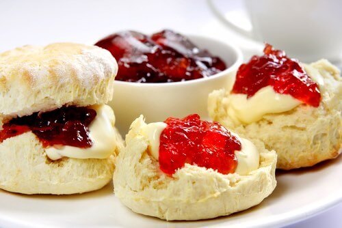 Homemade Biscuits Spread with Jam and Jelly Preserves