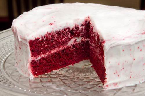 Is the vintage red velvet cake recipe actually a recipe for Philadelphia red cake? Bake one and see for yourself. This cake is red and chocolatey delicious.