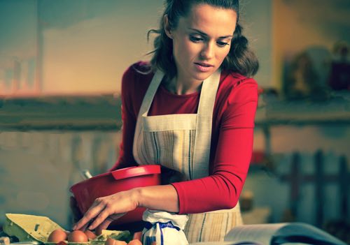 Lady Making a Cornmeal Pudding