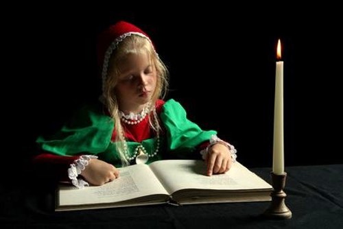 Young Renaissance Girl Consulting a Dessert Recipes Glossary