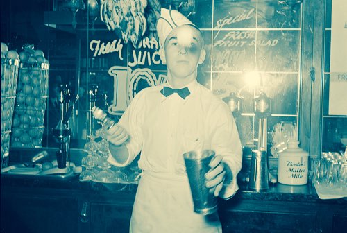 Vintage Soda Jerk Tossing Ice Cream Into Milk Shake Container