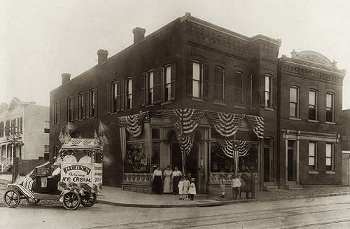 Vintage Ice Cream Truck Outside an Ice Cream Parlor, About 1919