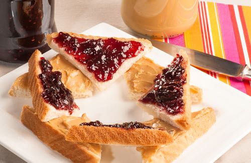 Triangular Sweet Sandwiches of Peanut Butter and Homemade Jam